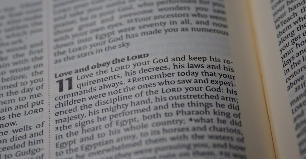 A detailed close-up of a Bible page focusing on a passage about love and obedience to God.