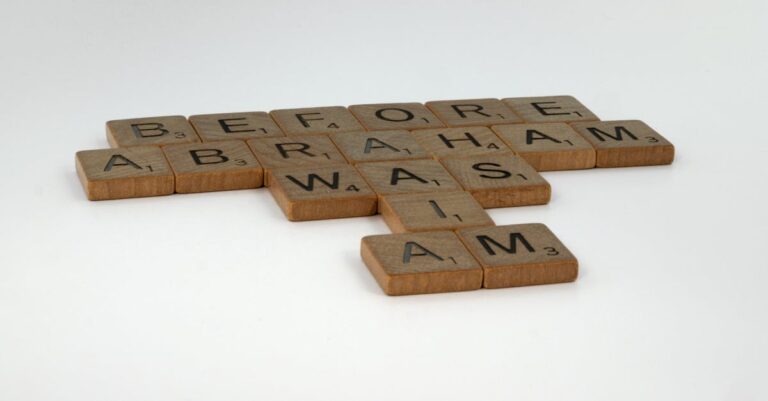 Scrabble letters arranged to form a thought-provoking quote on a white background.
