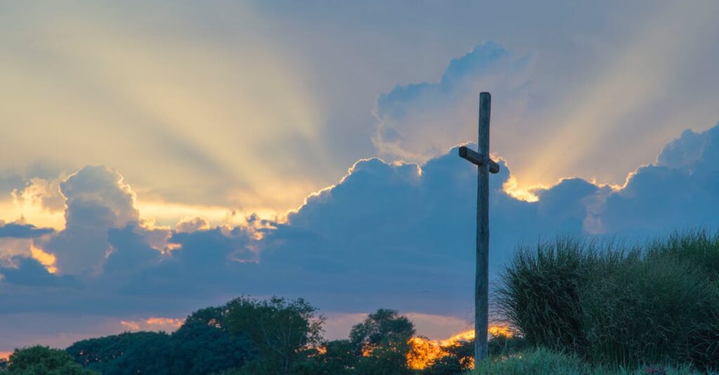 Beautiful sunset with wooden cross in a serene landscape of Frederick, MD, USA.
